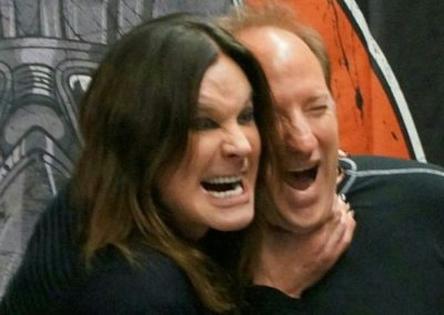 Mike Murphy being choked by Ozzy Osbourne before a Black Sabbath concert